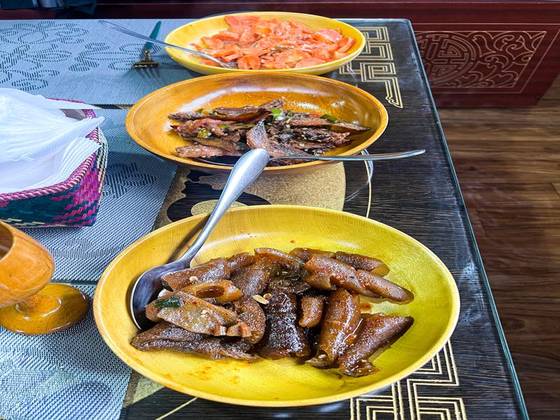 Authentic Bhutanese lunch - pig skin, dried fish, carrots