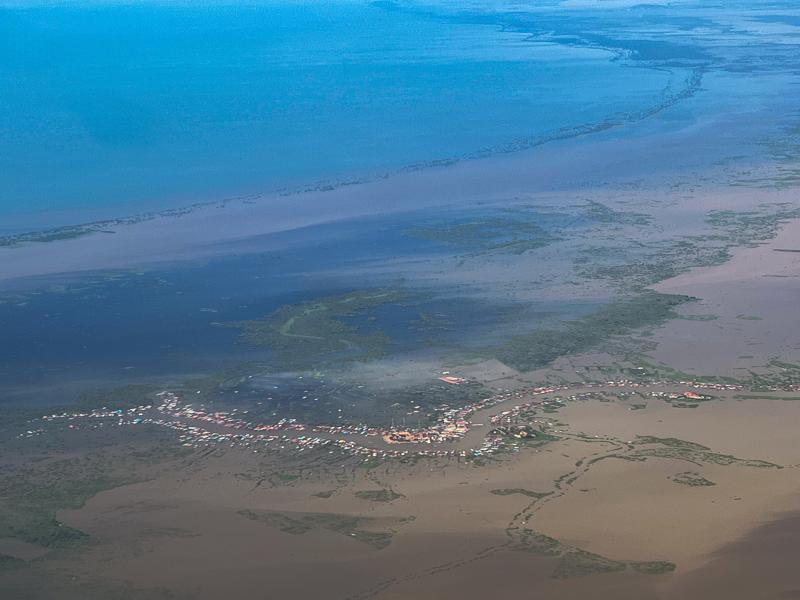 Flying over the fishing villages just outside of Siem Reap