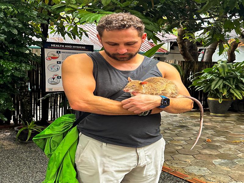 Holding the rat, it was very tame