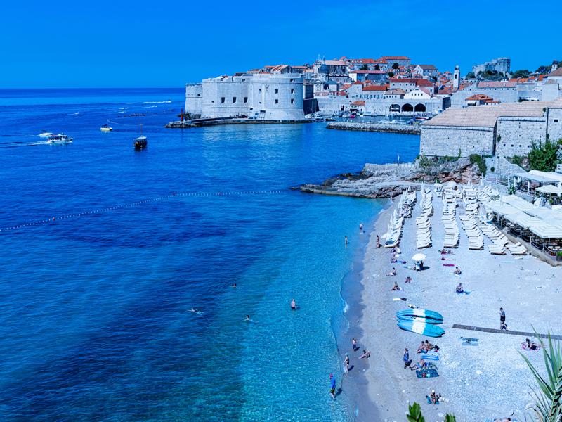 Walking past the beach to the city walls