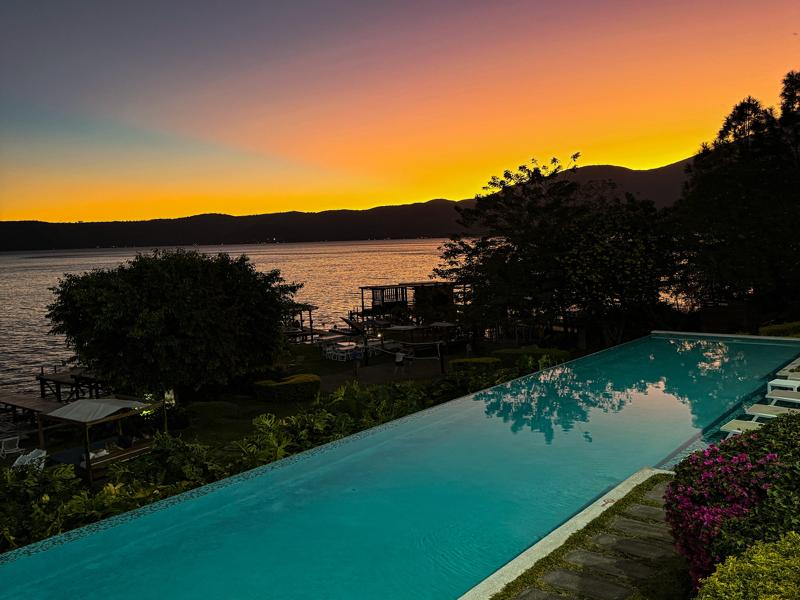Hotel pool at sunset