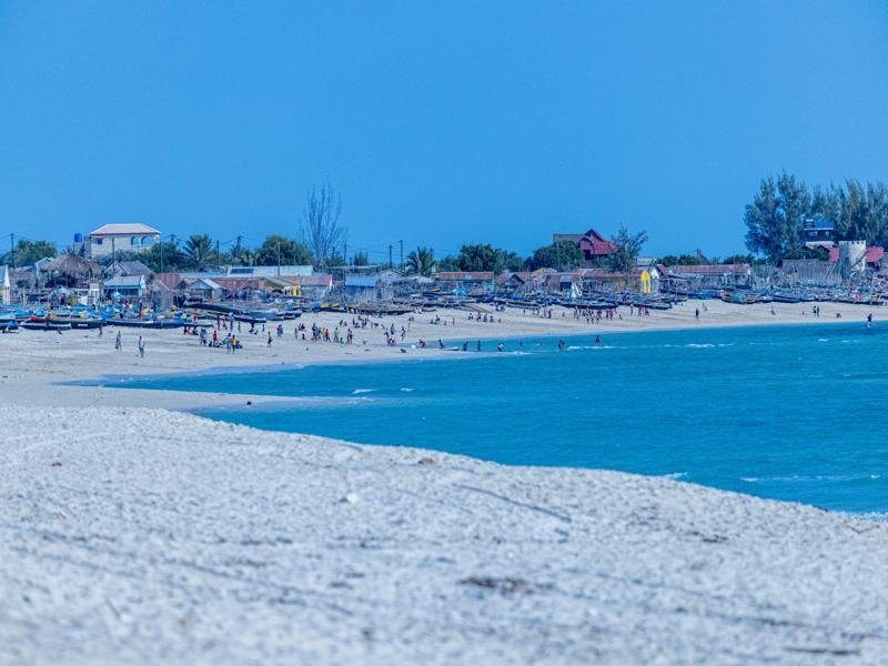 Walking down the beach near the town