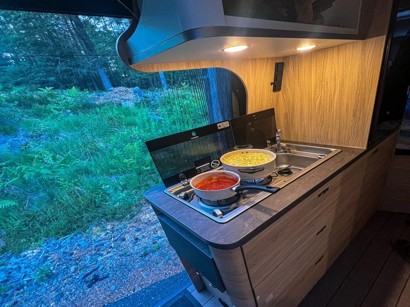 Preparing dinner in the campervan