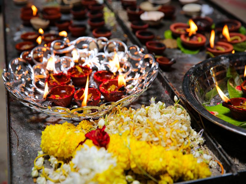 Candles lit inside the cave