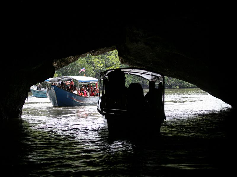 Boating through the 'crocodile' cave