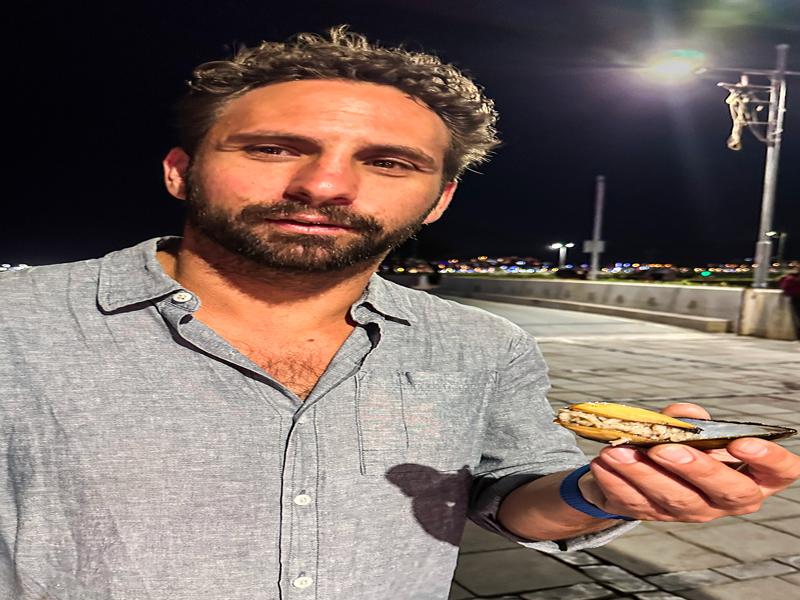 Trying the stuffed mussels in Izmir