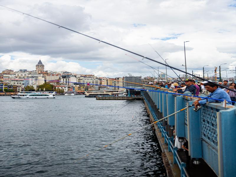 Fisherman with Galata tower in the background
